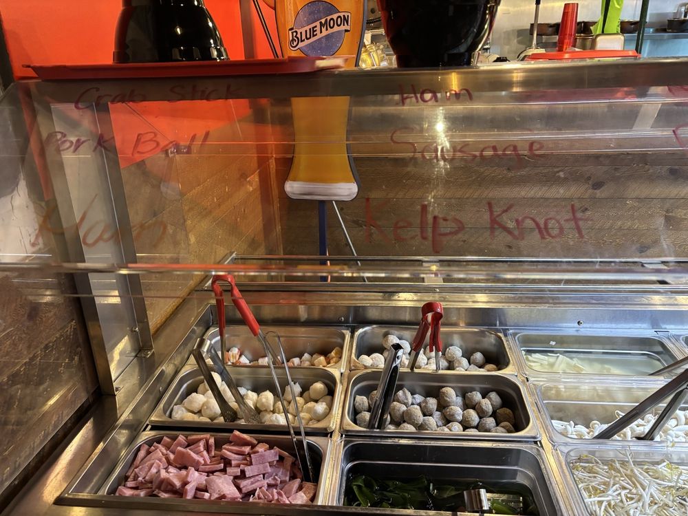 MALA NOODLE ingredient selection bar with proteins